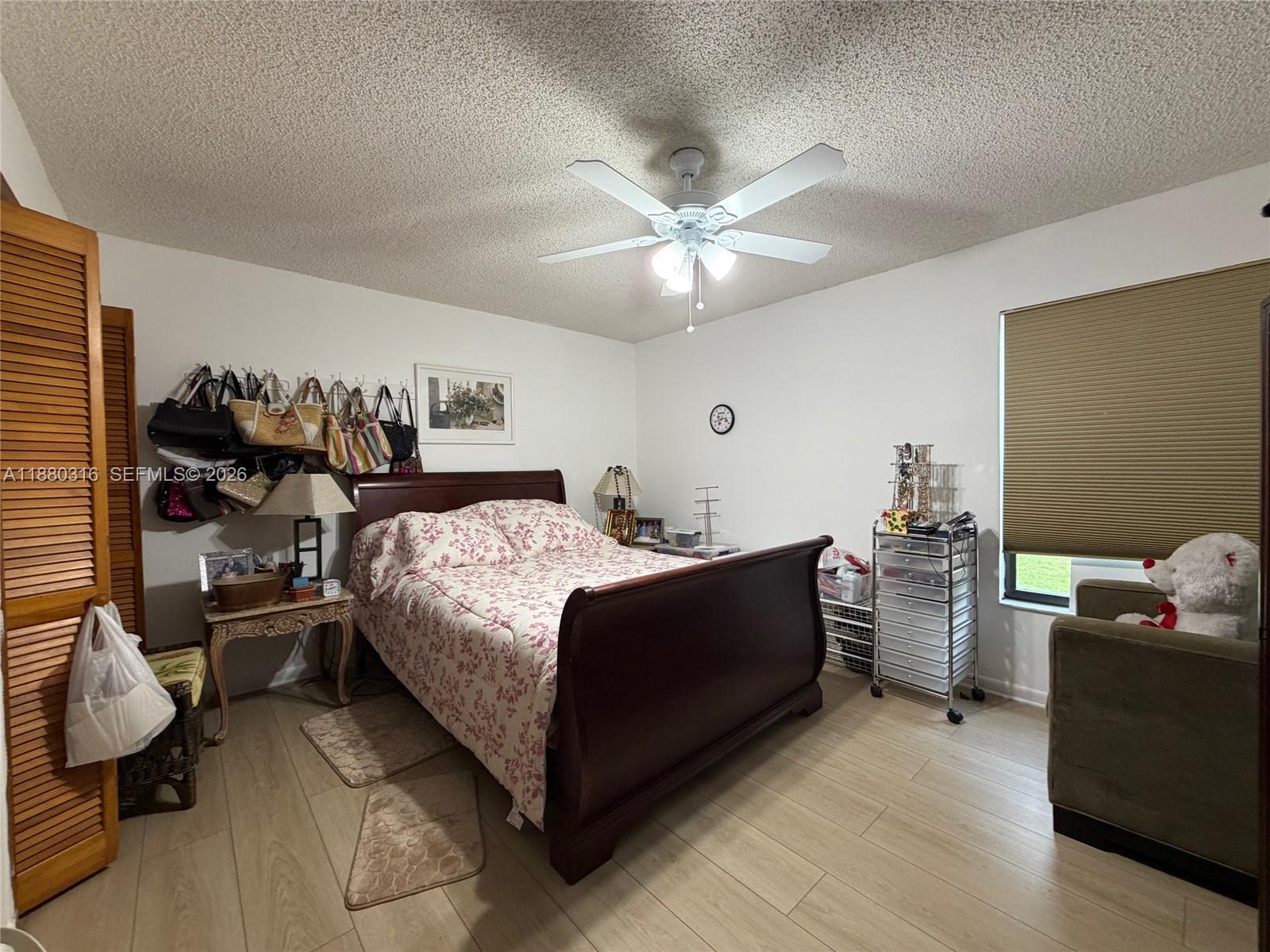 10204 Southwest 96th Court Miami, FL 33176 - Photo 32 of 54 a bed room with a bed and a window