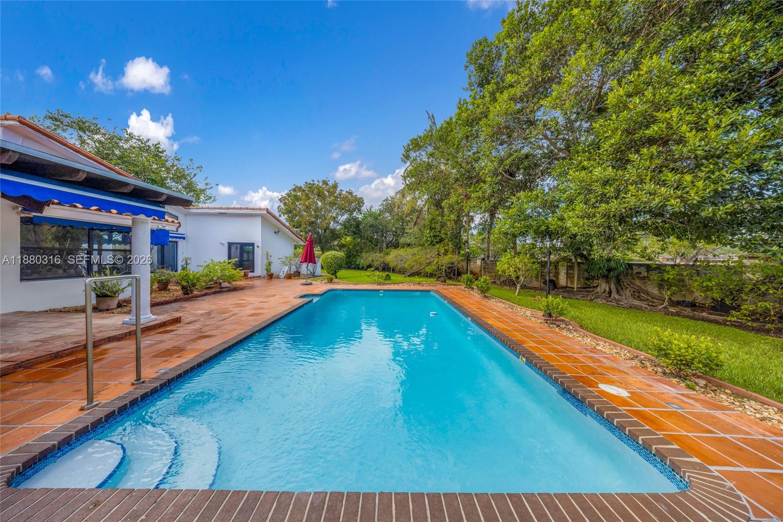 10204 Southwest 96th Court Miami, FL 33176 - Photo 40 of 54 a view of swimming pool with outdoor seating