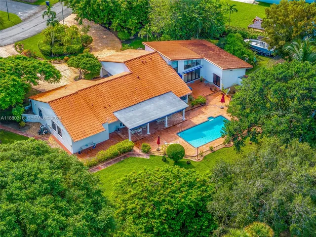 an aerial view of residential house with outdoor space