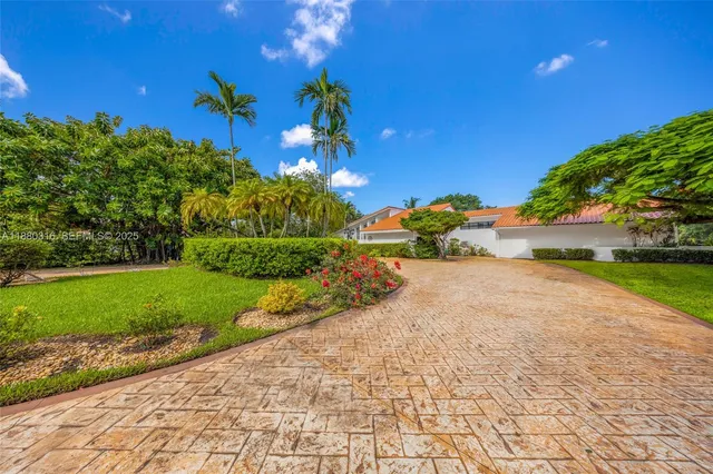 a view of a street with a park