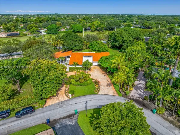 an aerial view of residential house with outdoor space
