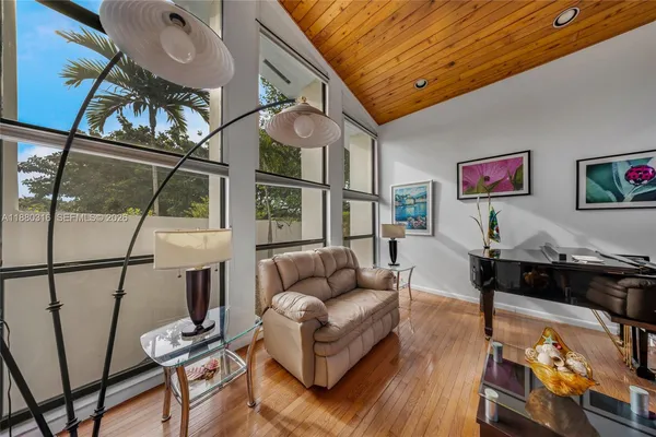a view of a living room with furniture