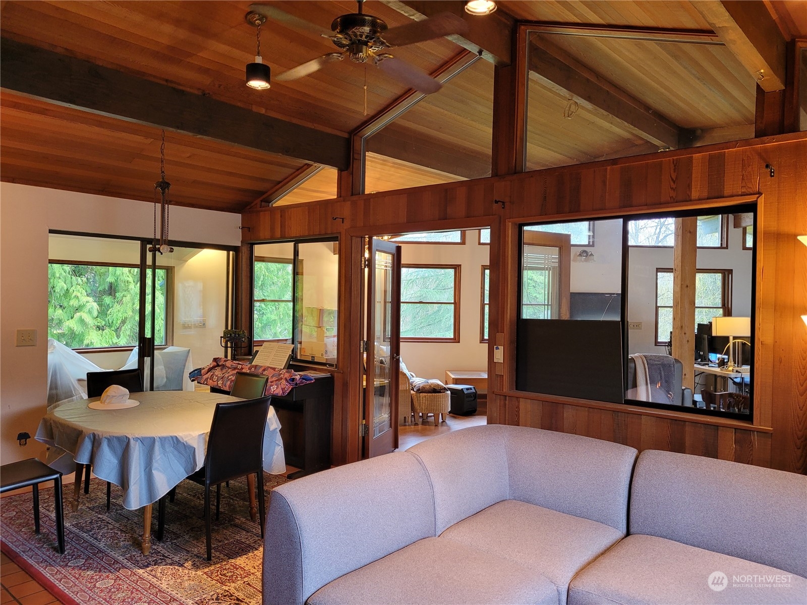 20925 Royal Anne Road Bothell, WA 98021 - Photo 8 of 10 a living room with furniture a large window and wooden floor