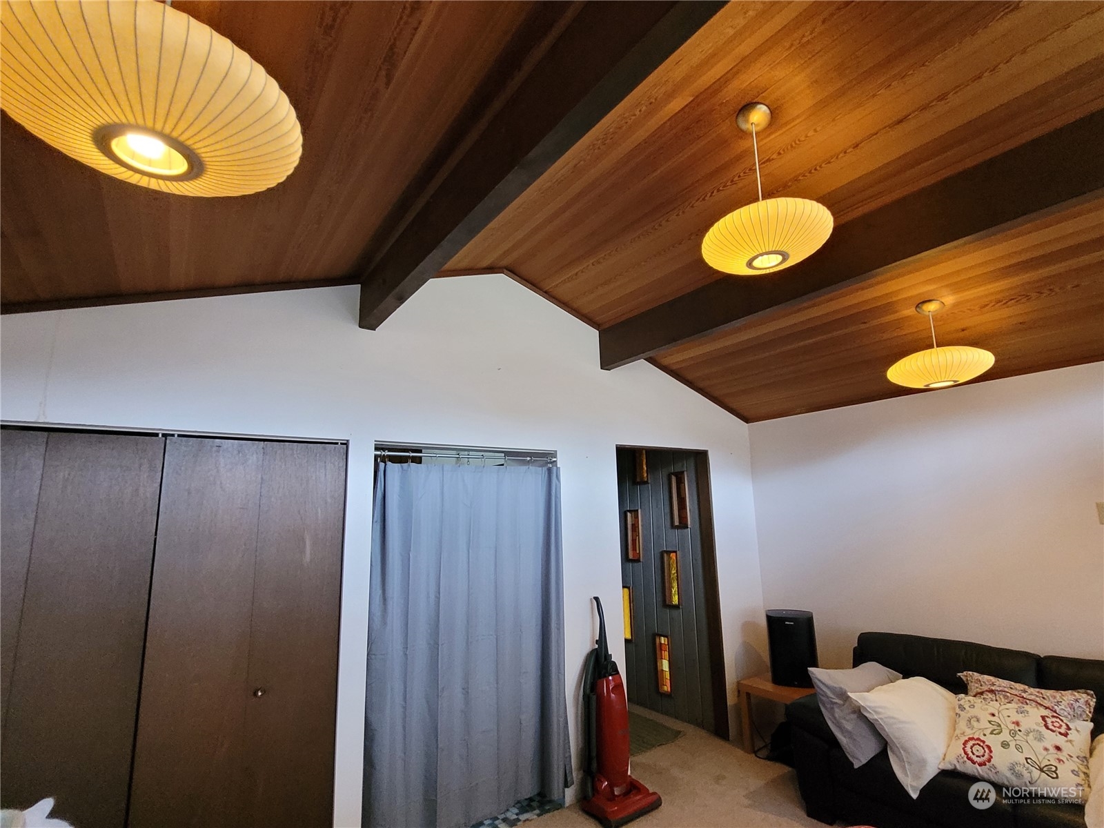 20925 Royal Anne Road Bothell, WA 98021 - Photo 9 of 10 a view of a livingroom with furniture and a chandelier