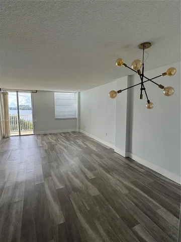 a view of a lake with a yard