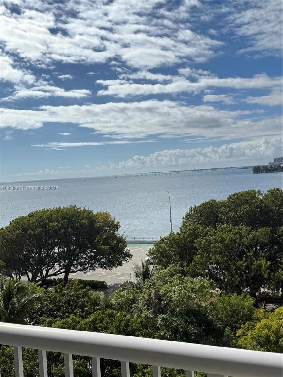 150 Southeast 25th Road, Unit 8L Miami, FL 33129 - Photo 6 of 6 a view of a lake with a yard