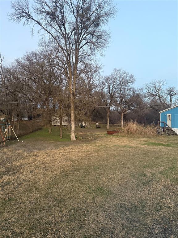 1179 Washington Lane Waco, TX 76708 - Photo 4 of 4 a view of a house with a yard