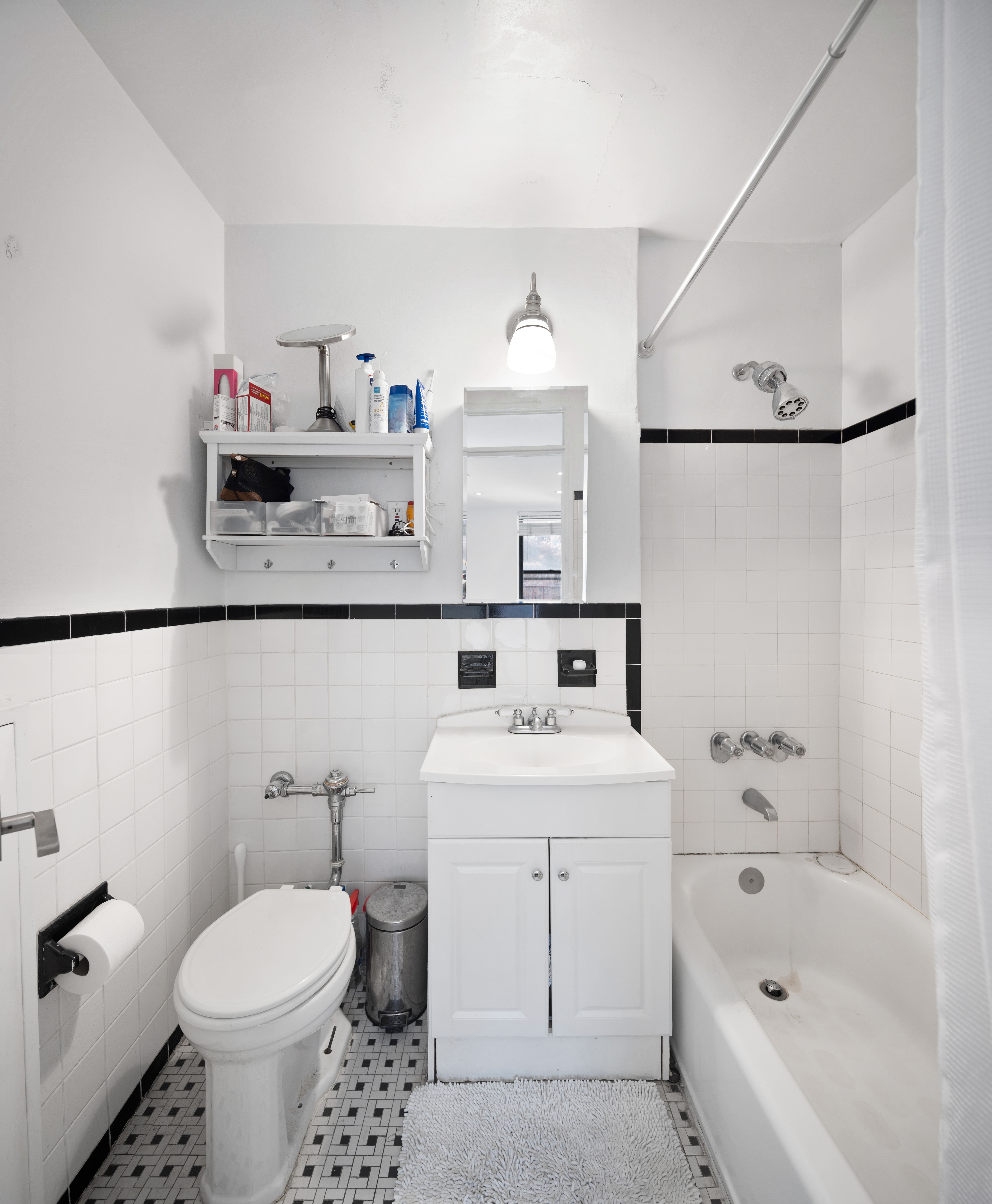 Undisclosed Address Manhattan, NY 10014 - Photo 3 of 4 a bathroom with a sink a toilet and a bathtub