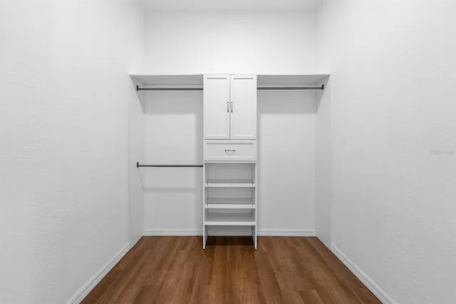 a view of an empty walk in closet