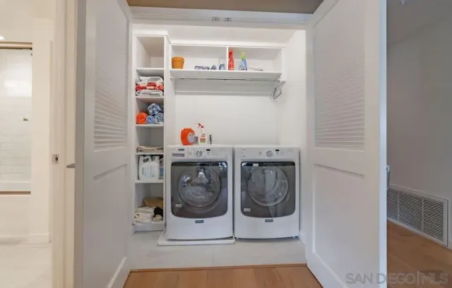 a utility room with dryer and washer