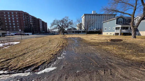a view of residential houses with city view