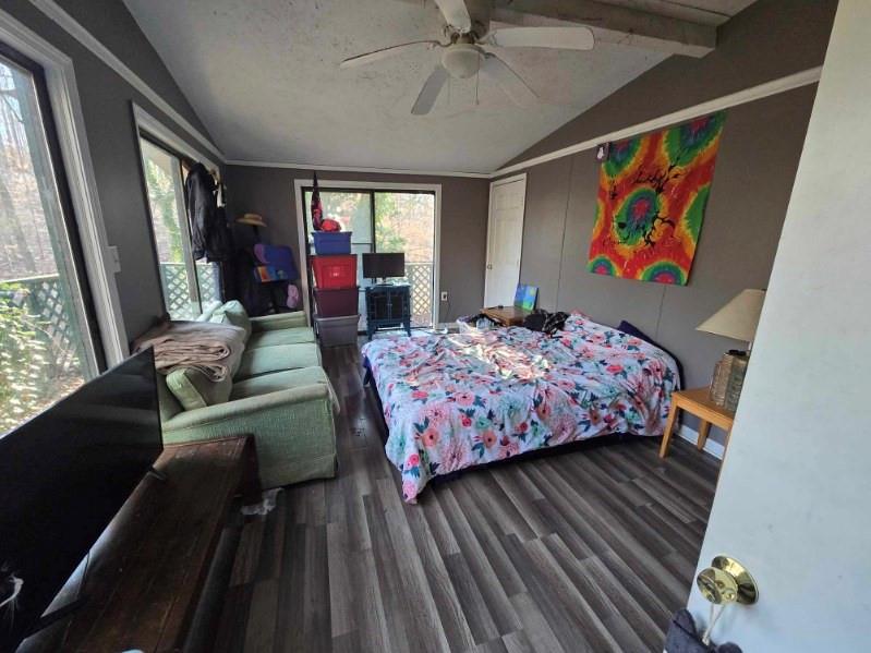 105 Memphis Lane Hartwell, GA 30643 - Photo 14 of 20 a bedroom with a bed and wooden floor