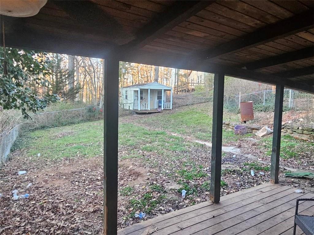 105 Memphis Lane Hartwell, GA 30643 - Photo 3 of 20 a view of a room that has a large window with wooden floor