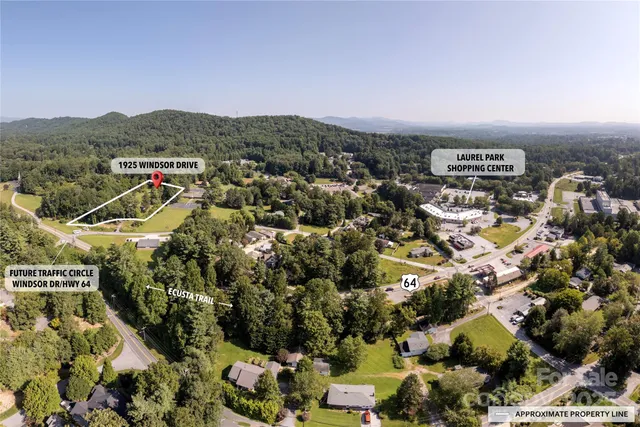 an aerial view of residential house with outdoor space