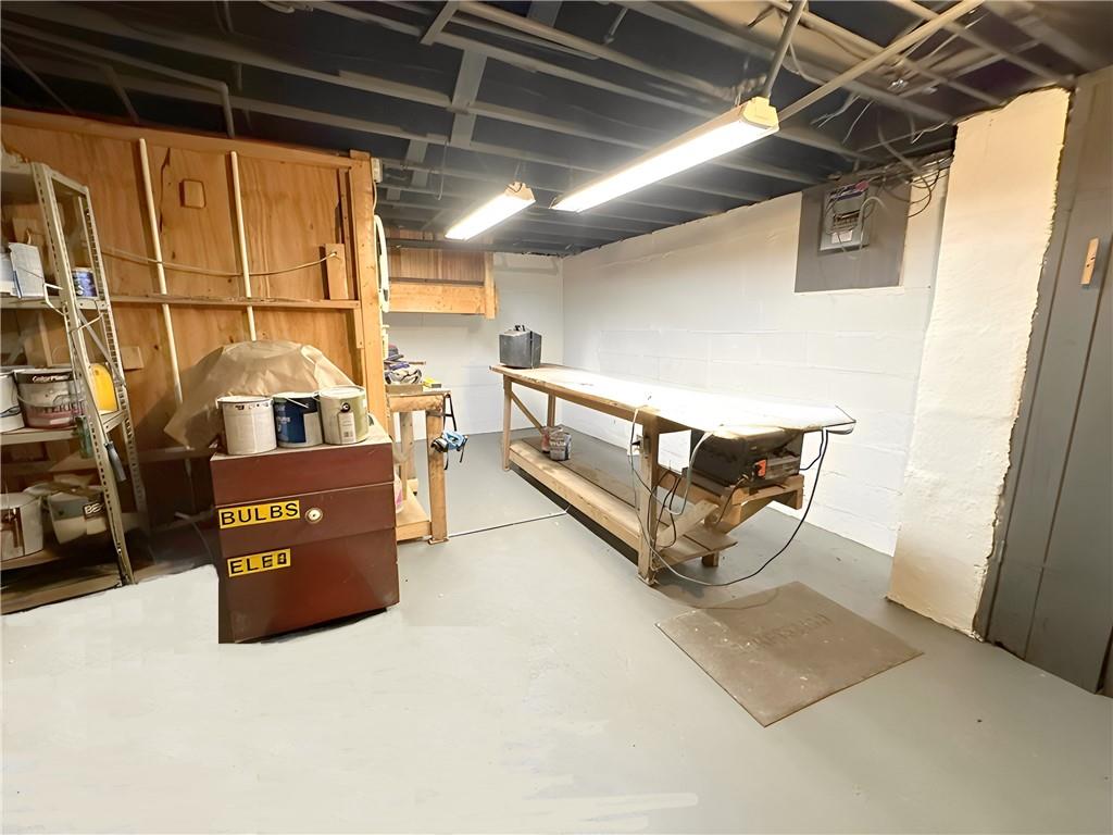 5515 Richland Road Gibsonia, PA 15044 - Photo 44 of 46 The 14’x14’ Workshop in the Lower Level is super dry and so handy when you have over two Acres! The walls, floor and ceiling were just painted! This is a walk-out basement with a Bathroom for convenience.