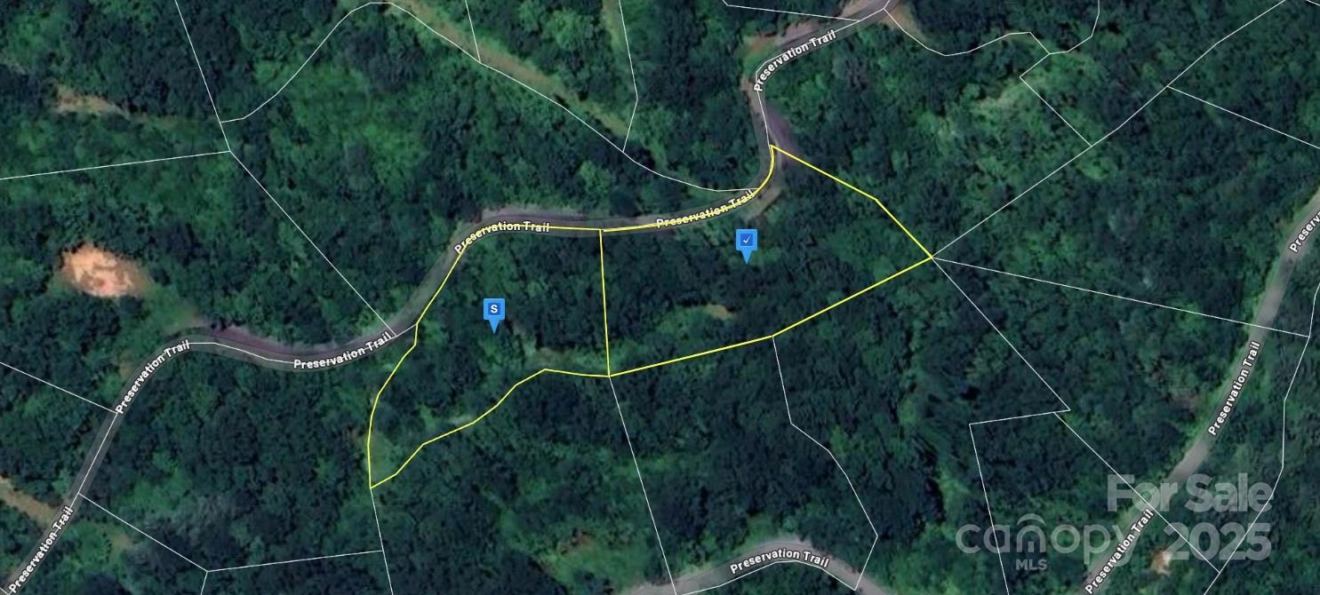 a view of a balcony and trees