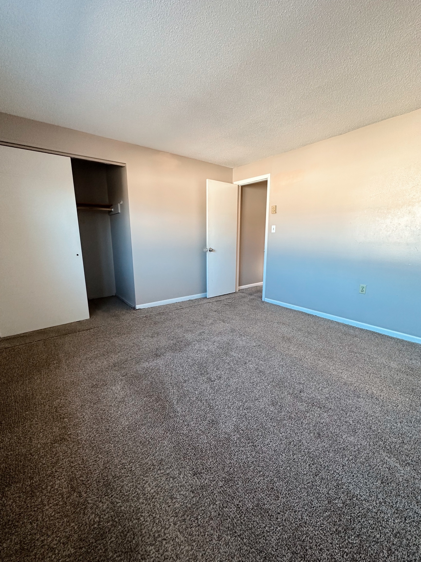 1081 New Haven Road, Unit 4B Naugatuck, CT 06770 - Photo 14 of 18 a view of an empty room with closet and window