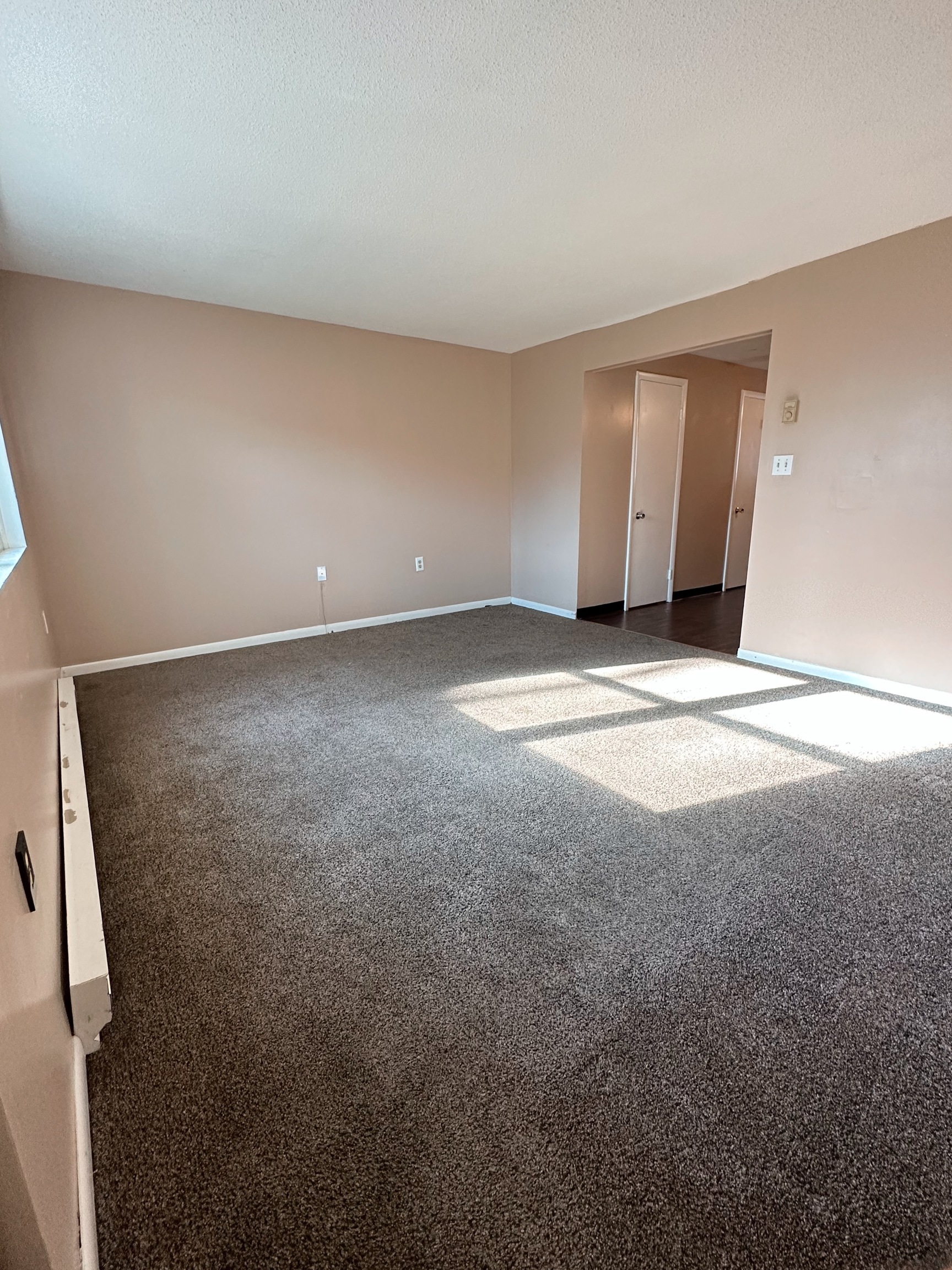 1081 New Haven Road, Unit 4B Naugatuck, CT 06770 - Photo 6 of 18 a view of an empty room with wooden floor