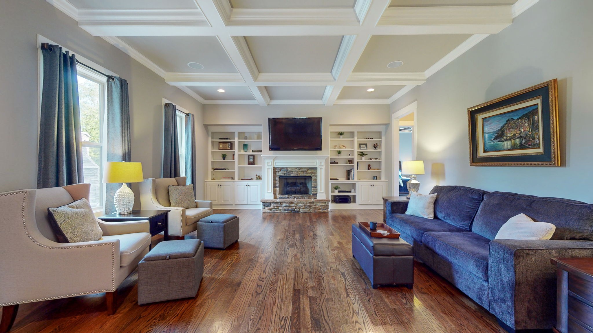 2667 Sporting Hill Bridge Road Thompson's Station, TN 37179 - Photo 12 of 42 a living room with furniture fireplace and a flat screen tv