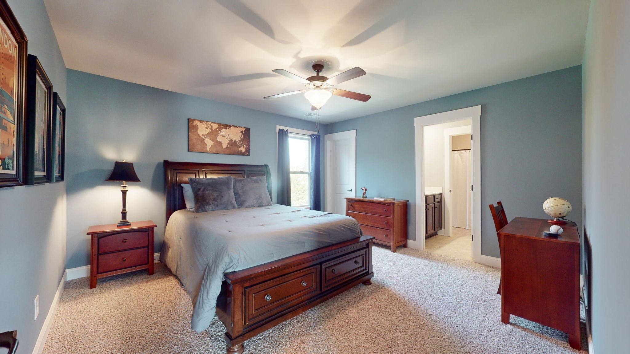 2667 Sporting Hill Bridge Road Thompson's Station, TN 37179 - Photo 23 of 42 a spacious bedroom with a bed and a chandelier
