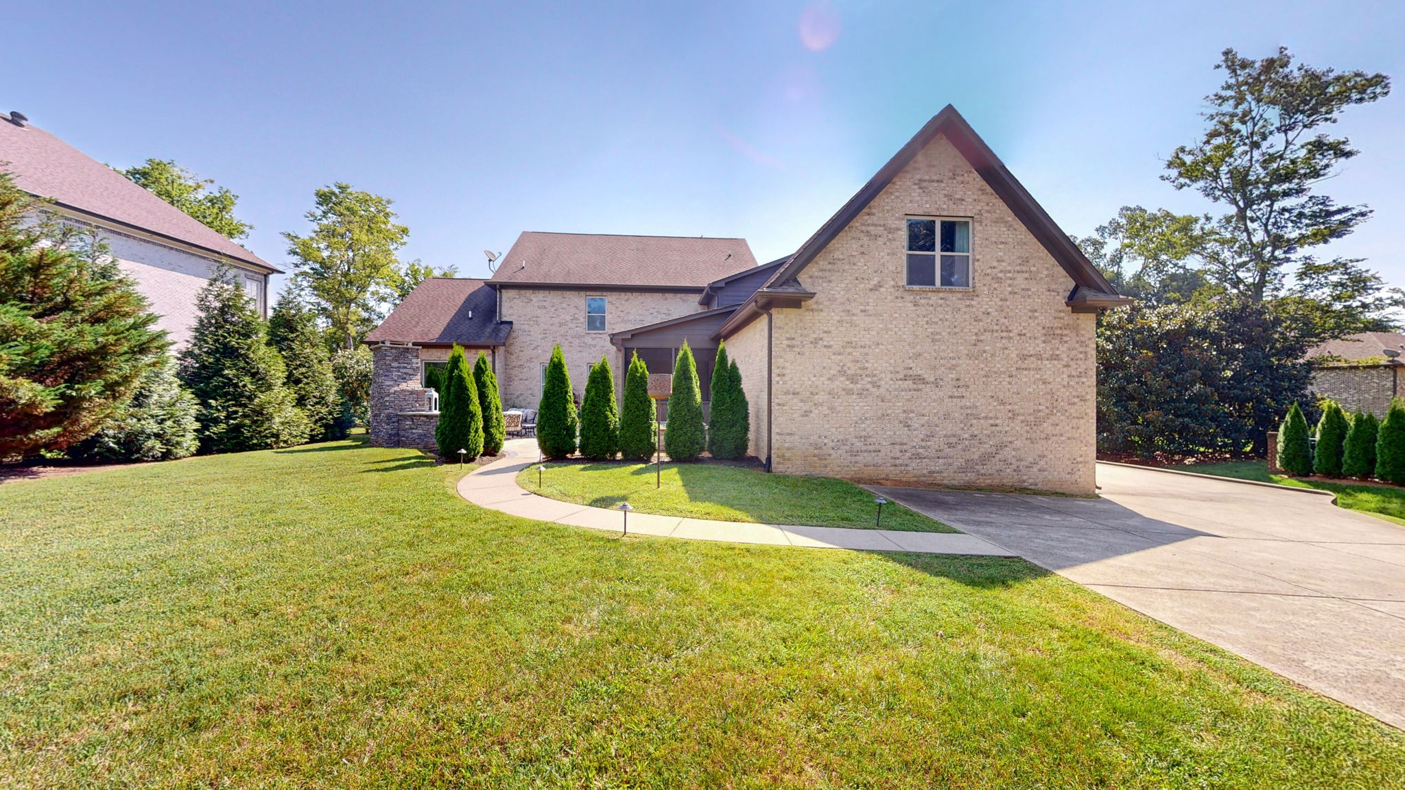 2667 Sporting Hill Bridge Road Thompson's Station, TN 37179 - Photo 32 of 42 a view of a house with a yard and potted plants