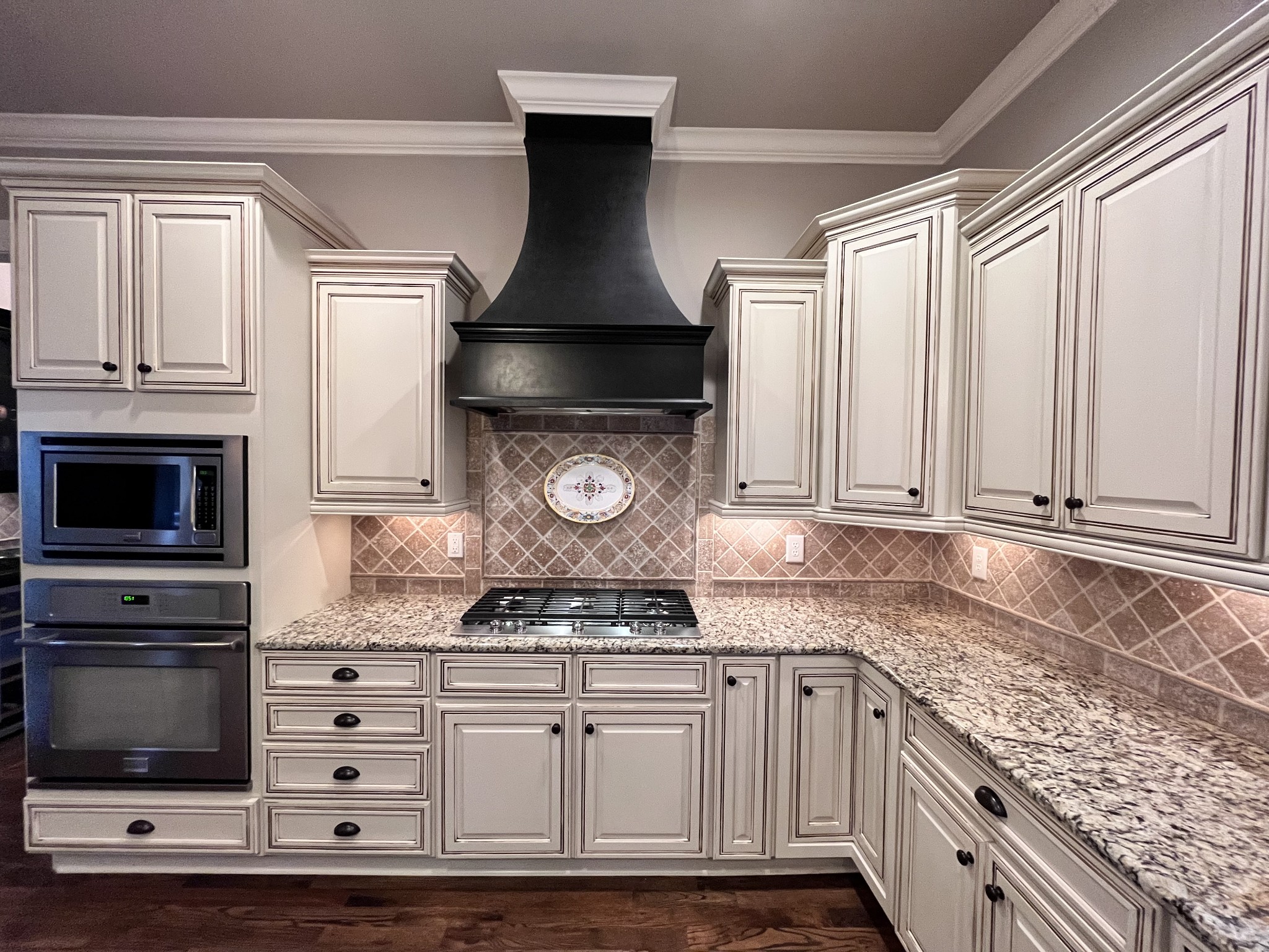 2667 Sporting Hill Bridge Road Thompson's Station, TN 37179 - Photo 8 of 42 a kitchen with granite countertop a stove and a microwave