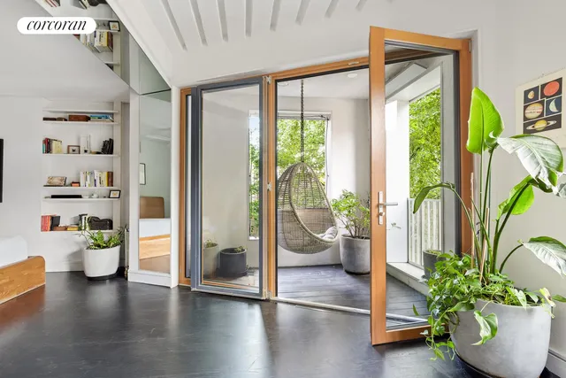 a view of a livingroom with furniture