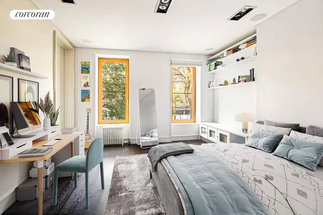 a view of a workspace with furniture window and outside view