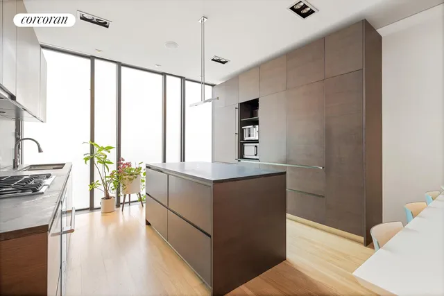a black and white photo of a living room