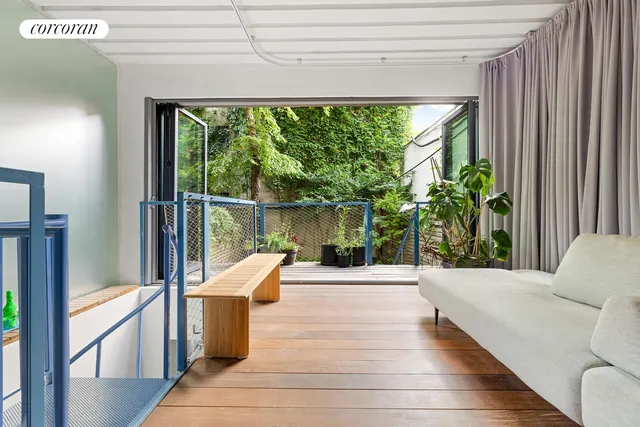 a kitchen with stainless steel appliances granite countertop a refrigerator a stove and a sink