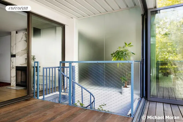 a kitchen with stainless steel appliances granite countertop a refrigerator a sink and a stove