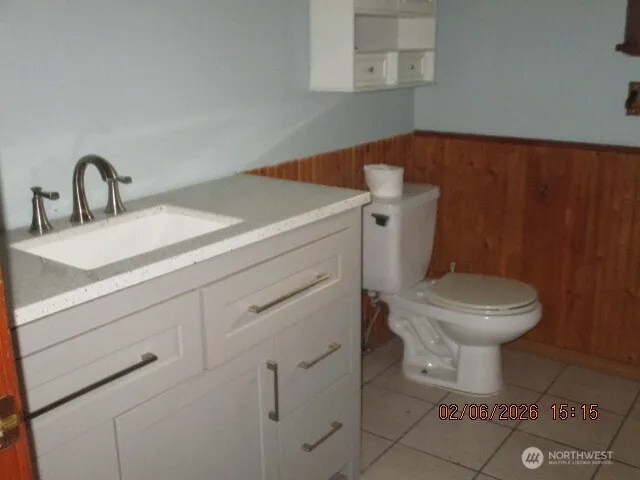 an empty room with a bench