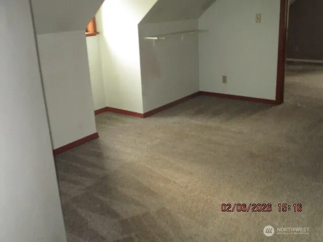 a bathroom with a sink and large window