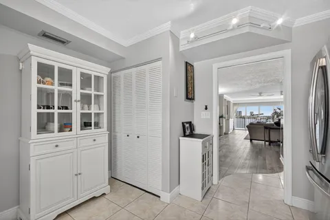 a room with furniture and a mirror