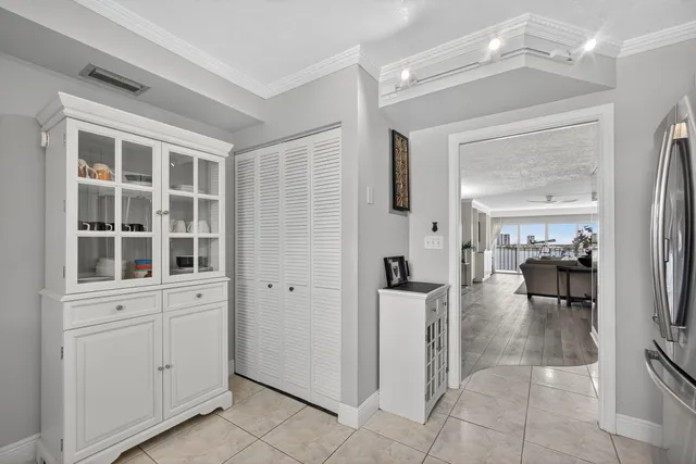 a room with furniture and a mirror