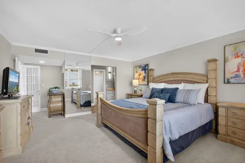 a bathroom with a granite countertop sink mirror and double