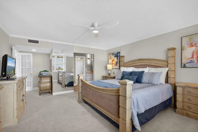 a bathroom with a granite countertop sink mirror and double