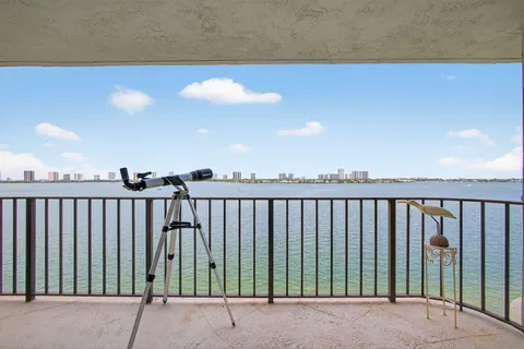 a view of balcony with furniture