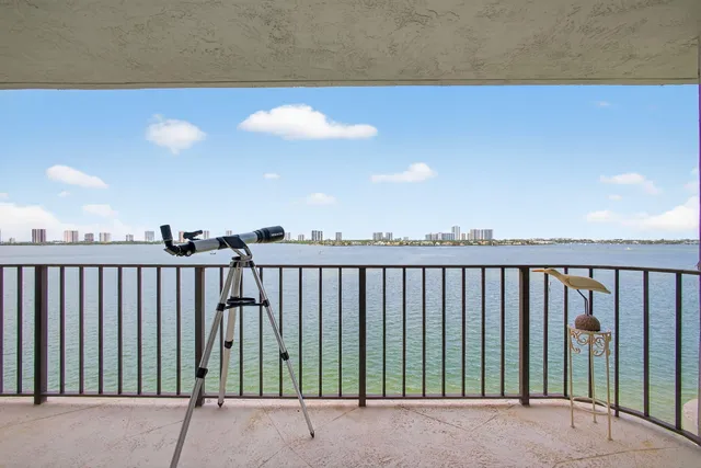 a view of balcony with furniture