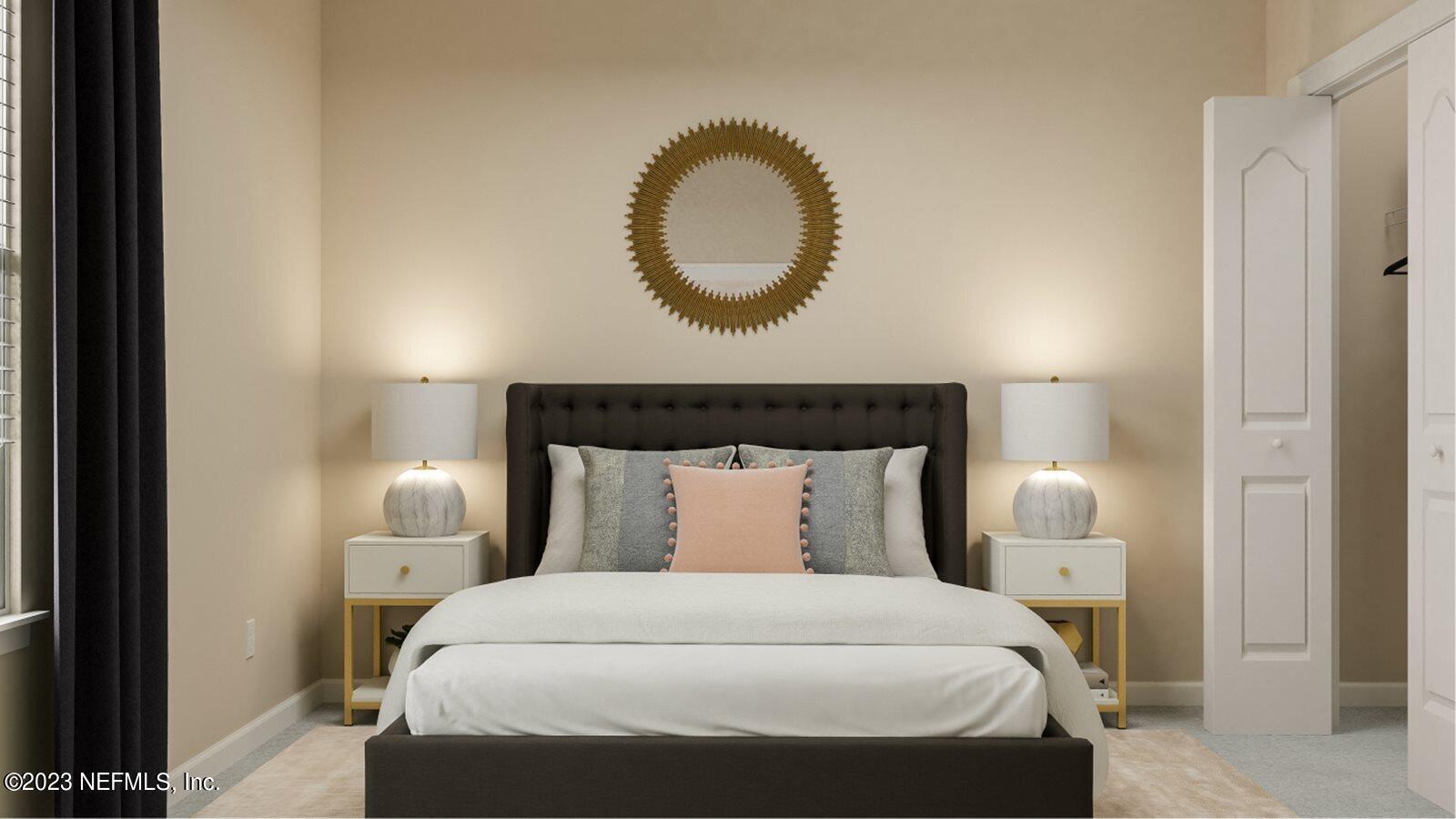 100 Round Robin Run St. Johns, FL 32259 - Photo 28 of 40 a bedroom with a bed and a painting on the wall