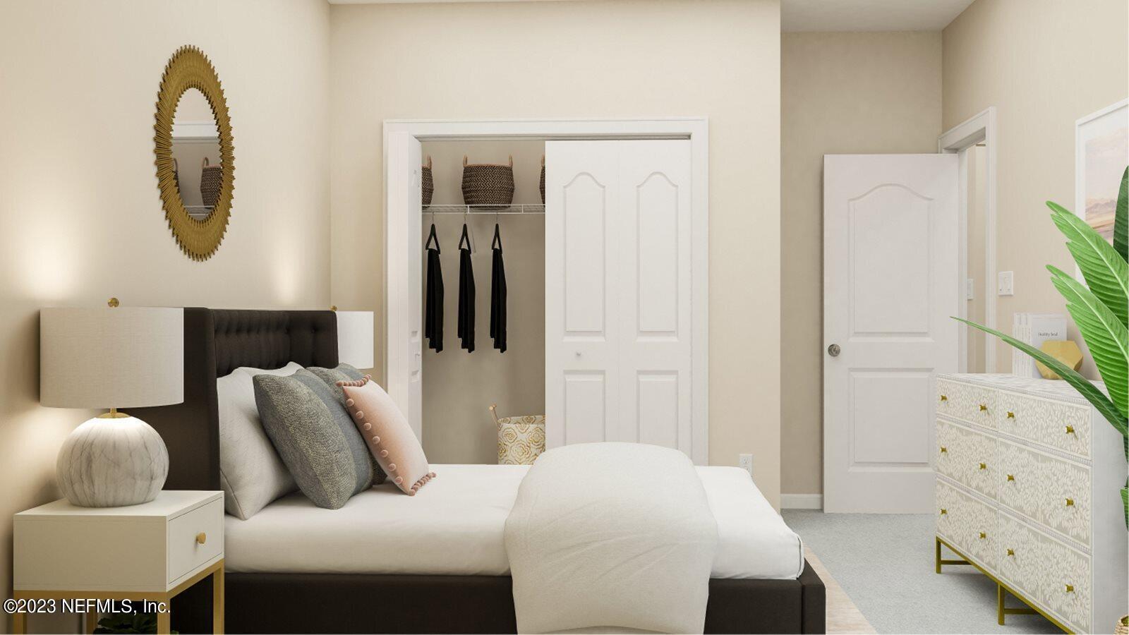 100 Round Robin Run St. Johns, FL 32259 - Photo 29 of 40 a bedroom with furniture and a mirror