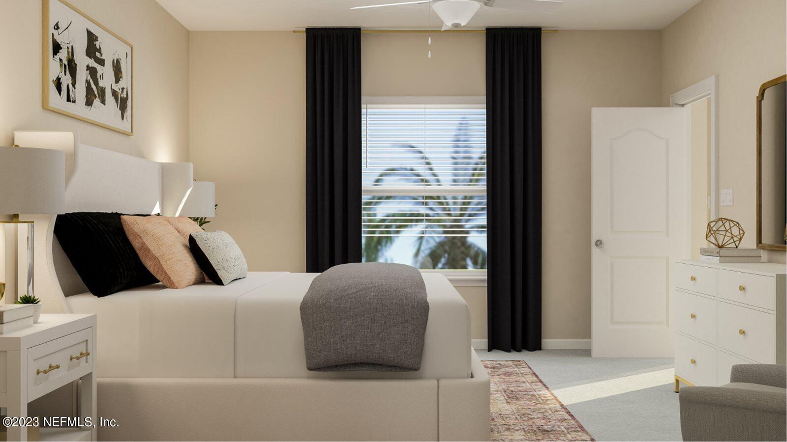 100 Round Robin Run St. Johns, FL 32259 - Photo 35 of 40 a bedroom with a bed and cabinet