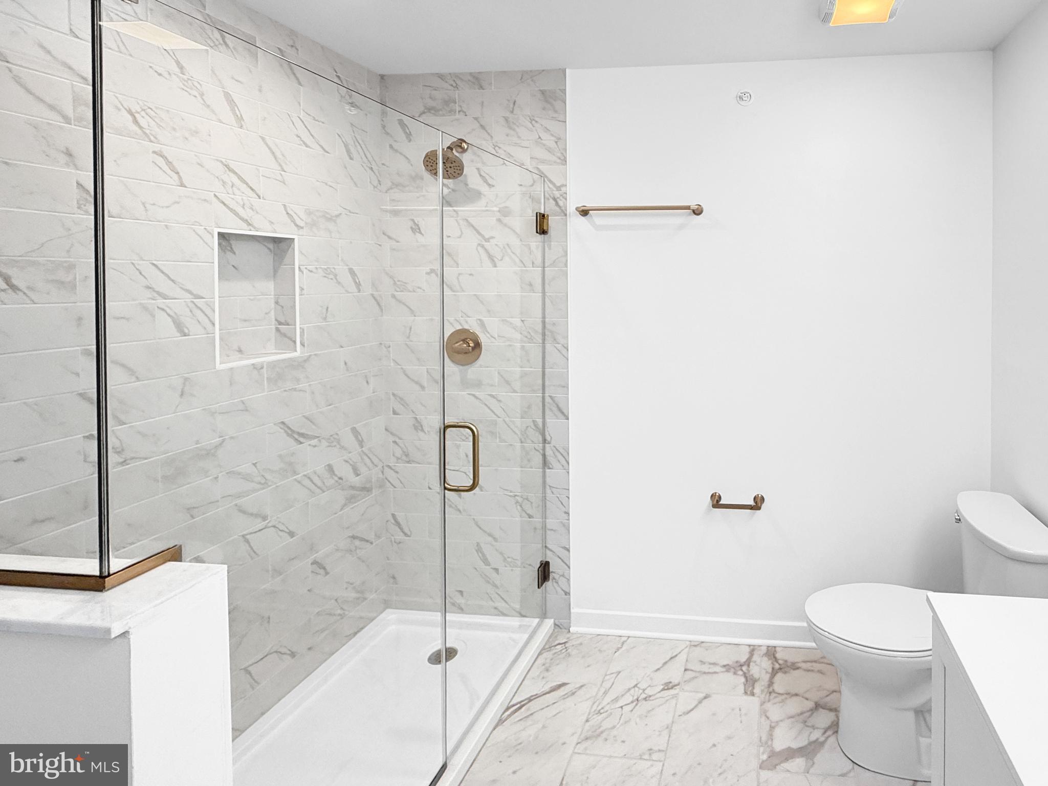 9 East Butler Avenue New Britain, PA 18901 - Photo 24 of 36 a bathroom with a toilet and shower