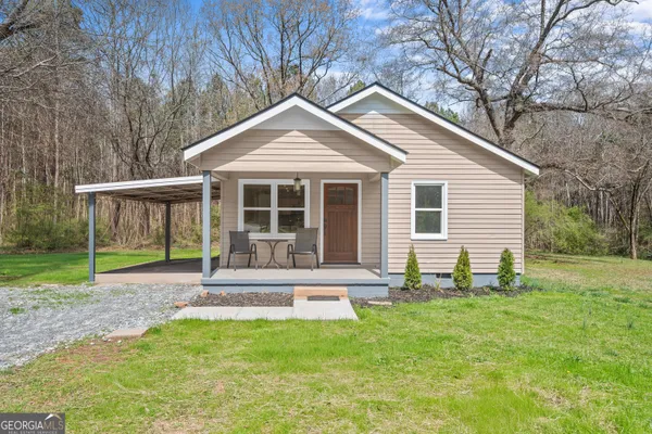 a house view with a garden space