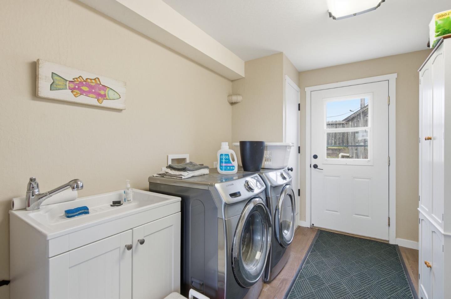 1263 Reservoir Road Pescadero, CA 94060 - Photo 64 of 66 a utility room with dryer and washer