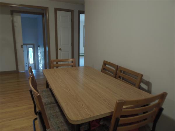 42 Montague Road Sunderland, MA 01375 - Photo 3 of 21 a balcony with table and chairs