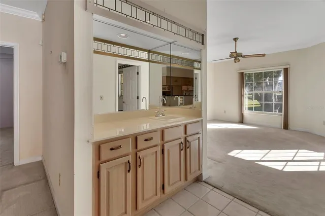 a view of bathroom with dual sinks
