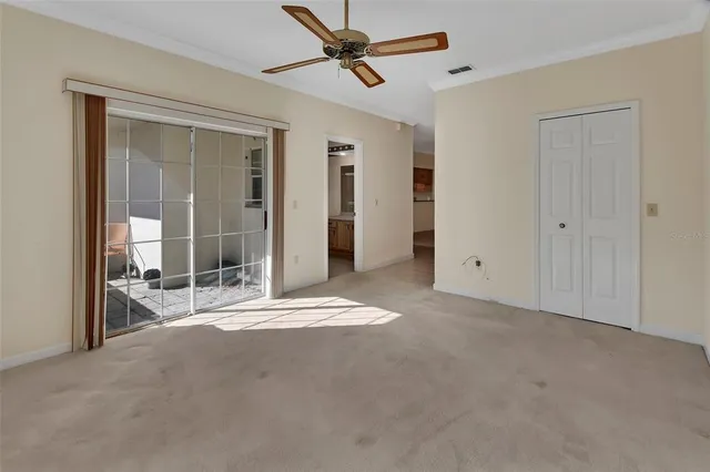 a view of livingroom with wooden floor and ceiling fan