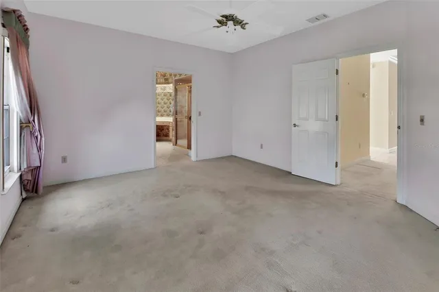 an empty room with windows