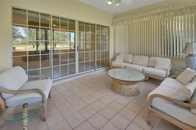 a bathroom with a sink mirror and toilet